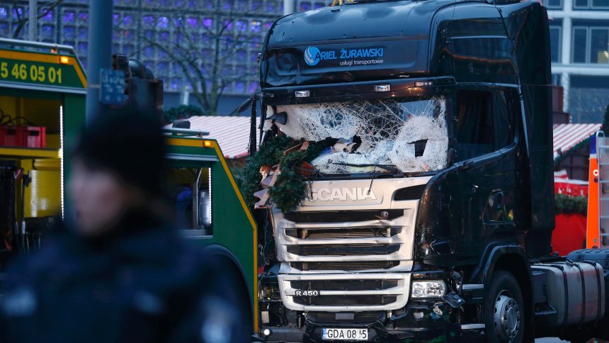 The crashed window of a truck is seen at a Christmas market on Breitscheidplatz square near the fashionable Kurfuerstendamm avenue in the west of Berlin, Germany, December 20, 2016. REUTERS/Hannibal Hanschke