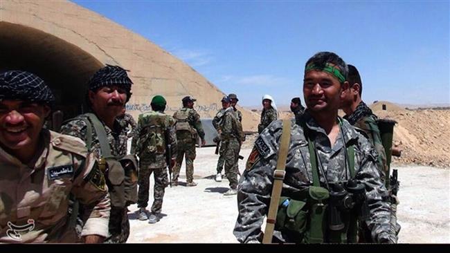 Combatientes de la Brigada Fatemiyun