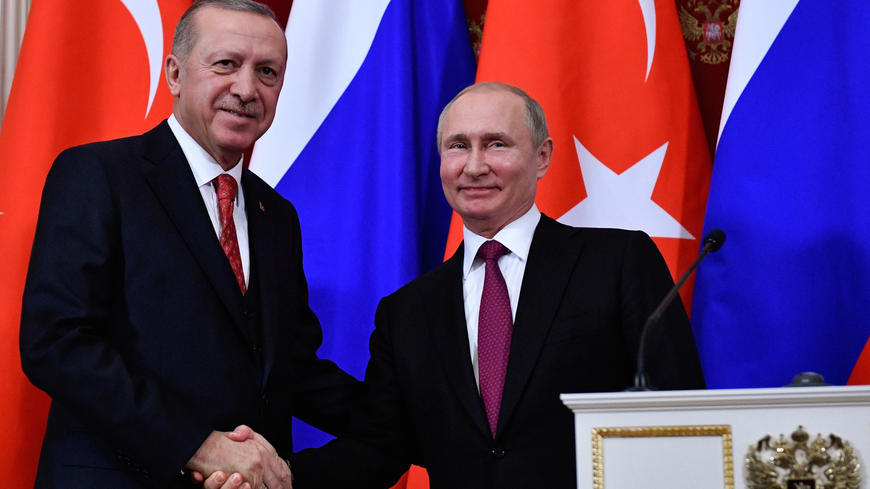 Russian President Vladimir Putin and his Turkish counterpart Recep Tayyip Erdogan shake hands at the end of a joint press conference following their meeting at the Kremlin in Moscow, Russia, January 23, 2019. Aleksander Nemenov/Pool via REUTERS - RC1C4E87B9A0