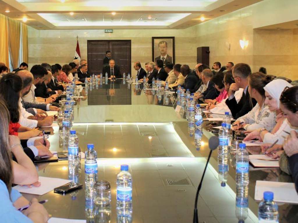 faisal-al-mekdad-y-representantes-onu-en-siria