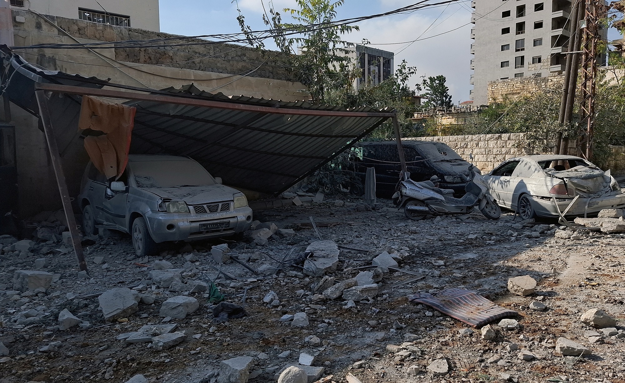 A view of damaged vehicles at a site hit by an Israeli strike in Nabatieh, amid the ongoing hostilities between Hezbollah and Israeli forces, southern Lebanon October 16, 2024. REUTERS/Ali Hankir