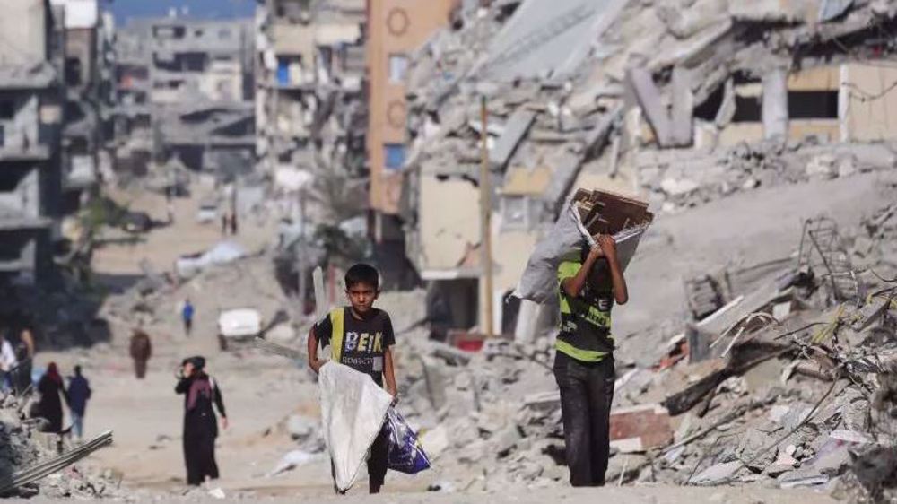 ninos-caminan-edificios-destruidos-gaza-2